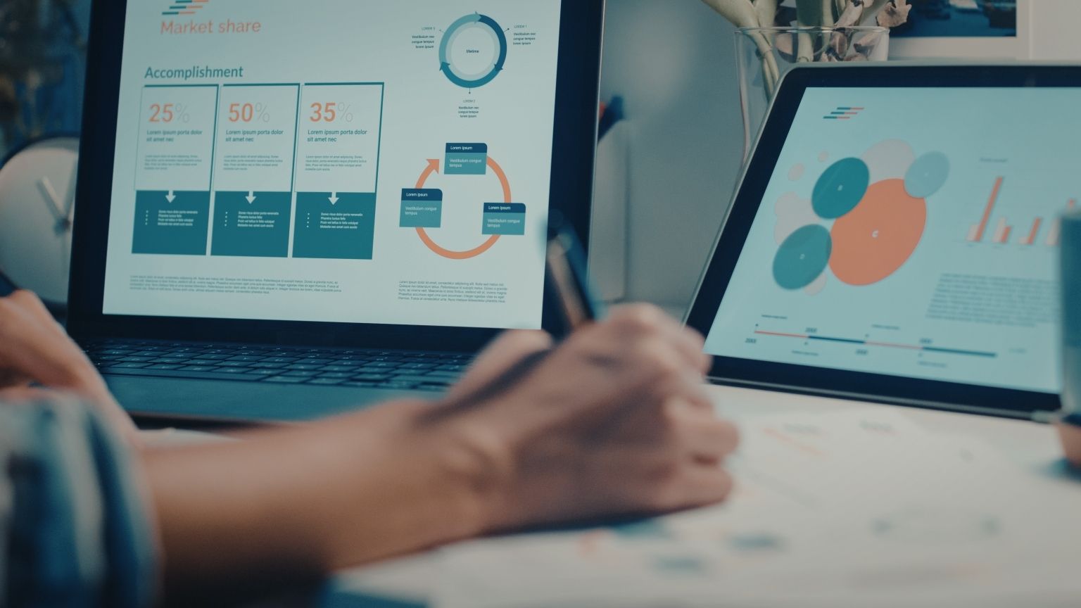 A digital marketer analyzing data on a computer screen to optimize GHL landing pages.