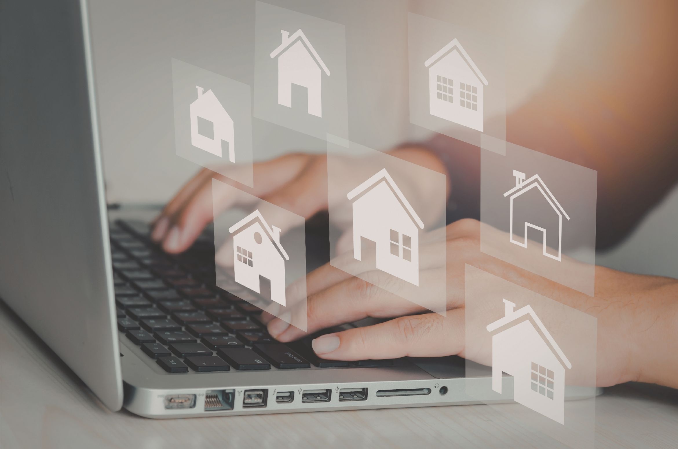 A productive remote worker managing essential real estate VA tasks like MLS listings on a dual-monitor setup.