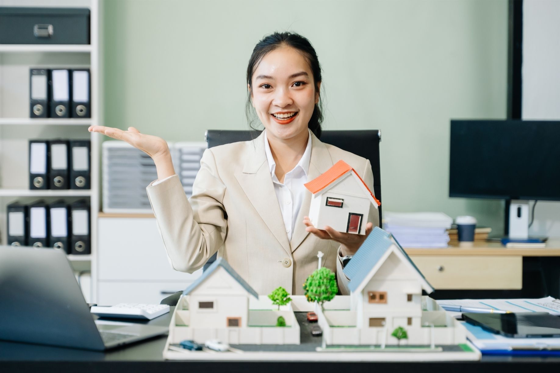 A professional analyzing property leads and automation workflows using GoHighLevel for real estate.
